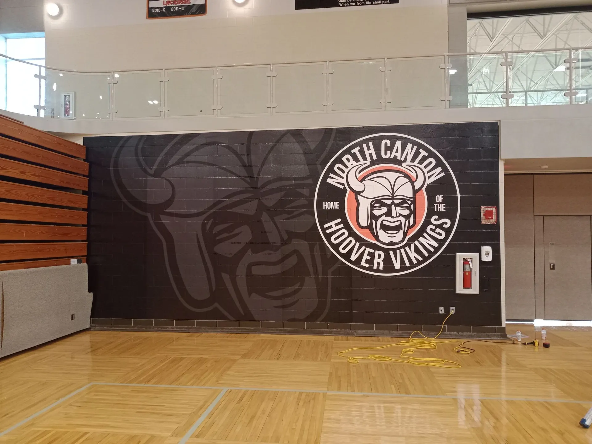 Custom architectural block wall wrap installed in a school gym in Ohio